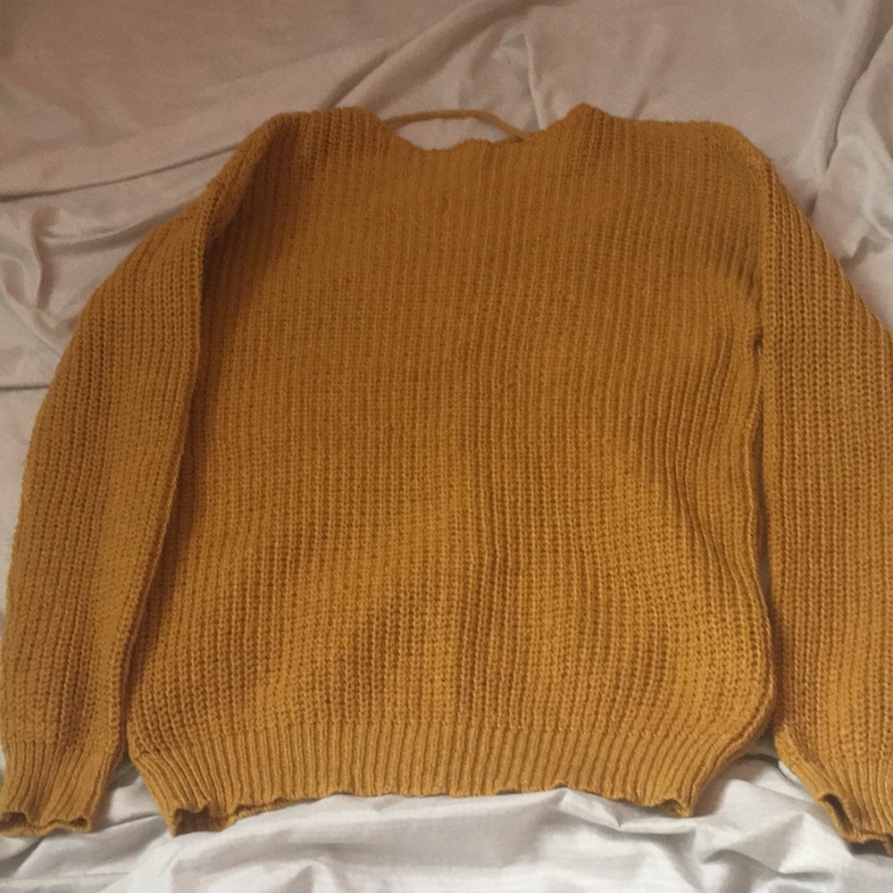 yellow sweater